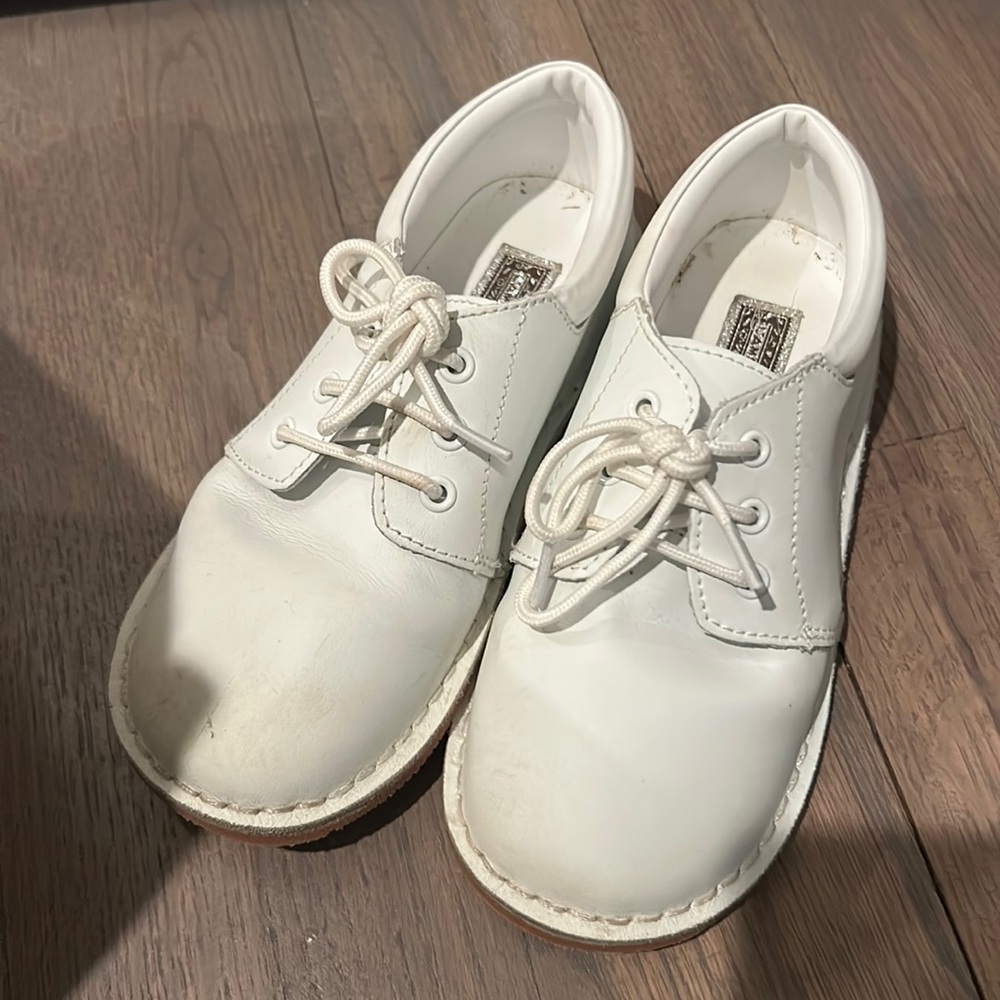 White leather. Used once